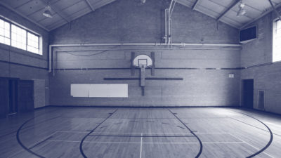 An empty basketball court in a school