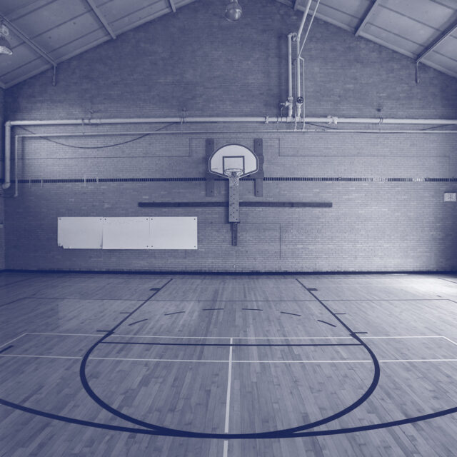 An empty basketball court in a school