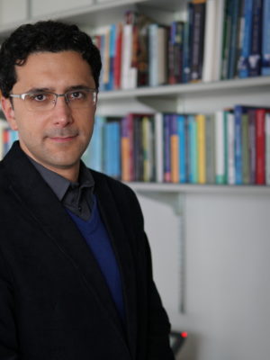 Headshot of Ali Rowhani-Rahbar, MD, MPH, PhD is the Bartley Dobb Endowed Associate Professor for the Study and Prevention of Violence in the Department of Epidemiology at the University of Washington.