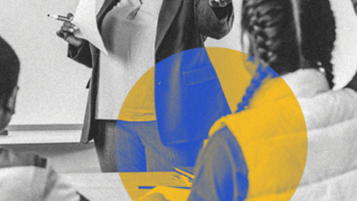 A black-and-white photo of two students sitting at a desk, looking at a teacher who is standing at a whiteboard. The photo is overlaid with a yellow and blue circle.